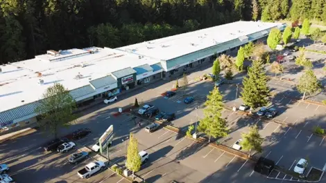 Aerial view of Ken's Korner Mini Storage and shopping plaza.