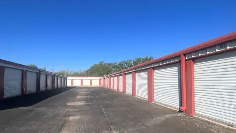 Exterior of outdoor storage at MRC Self Storage facility with paved roads.