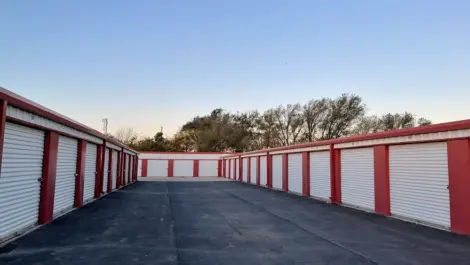 Exterior of outdoor storage at MRC Self Storage facility with paved roads.