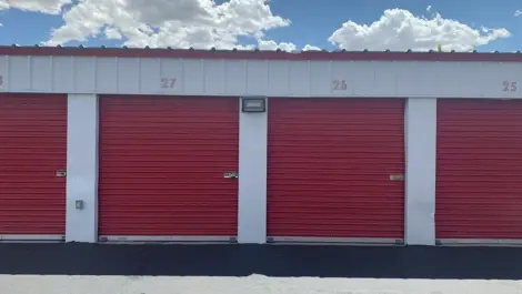 Exterior of outdoor red storage units at Mountain Vista North Mini Storage.
