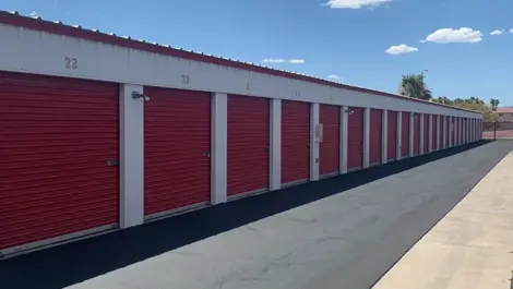 Exterior of outdoor red storage units at Mountain Vista North Mini Storage.
