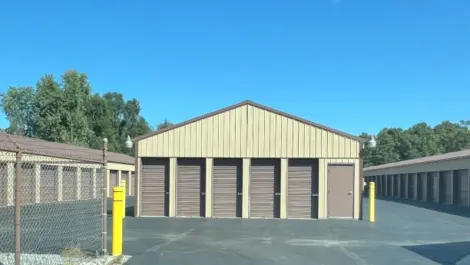Rows of drive-up storage units with paved lanes at Lambertville Mini Storage Secor.
