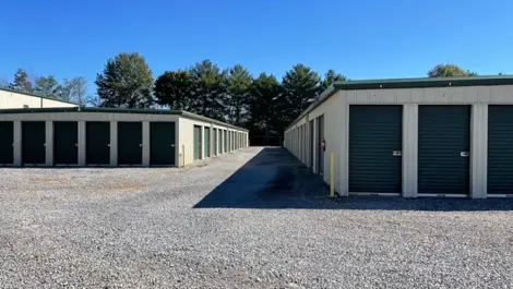 Exterior view of unit buildings and paved lanes at Volunteer Storage Tellico Village.