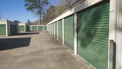Drive-up storage units with wide paved lanes at Town and Country Self Storage.