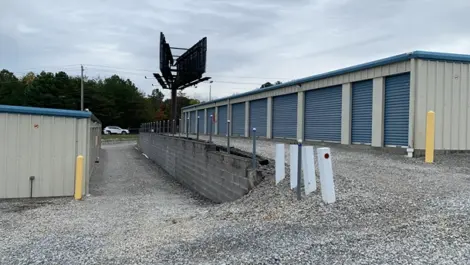 Storage unit row and gravel paths at Volunteer Storage Vonore.