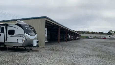Facility exterior with covered vehicle parking and open unit access at Volunteer Storage Vonore.