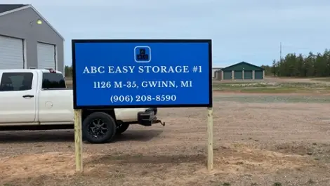 ABC Easy Storage #1 signage in front of maintenance truck and building