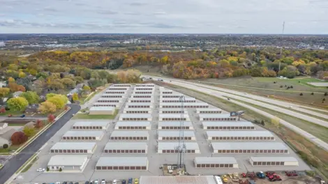 Wide view of unit buildings and access lanes at Osprey Storage Mankato.