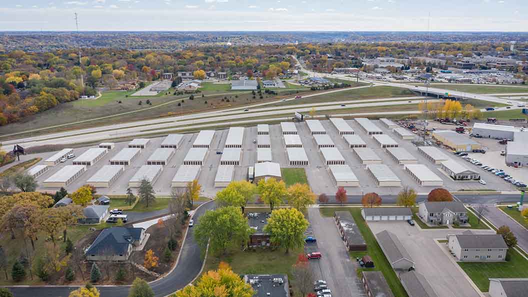 Drive-up storage units with roll-up doors and paved lanes at Osprey Storage Mankato.